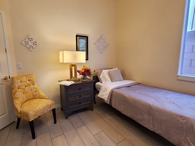 Private bedroom with natural light and cozy décor